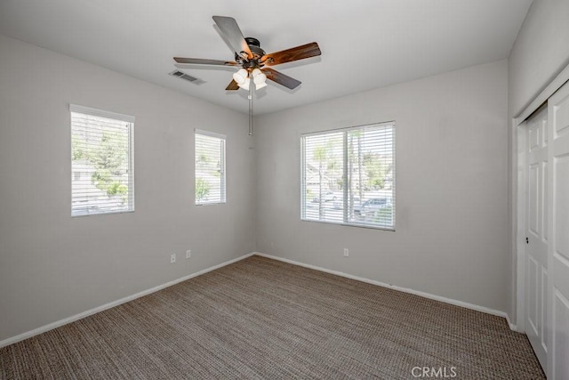 30118 Galbreth Ct, Castaic, CA 91384 - unfurnished bedroom featuring carpet, a closet, and ceiling fan