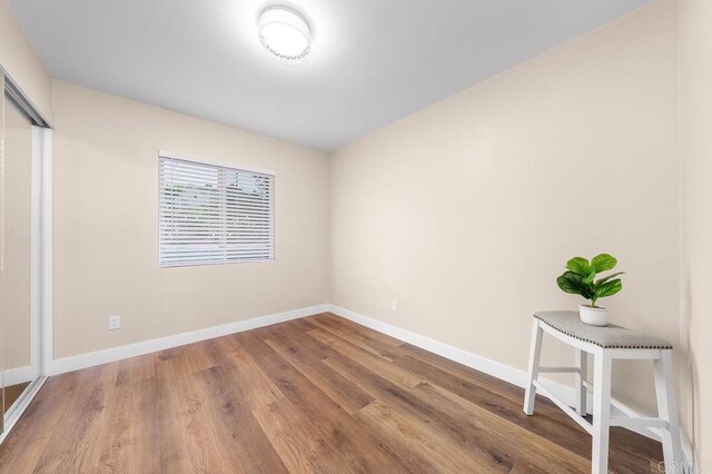 6270 Meadowcrest Dr, La Mesa, CA 91942 - unfurnished bedroom with baseboards and wood finished floors