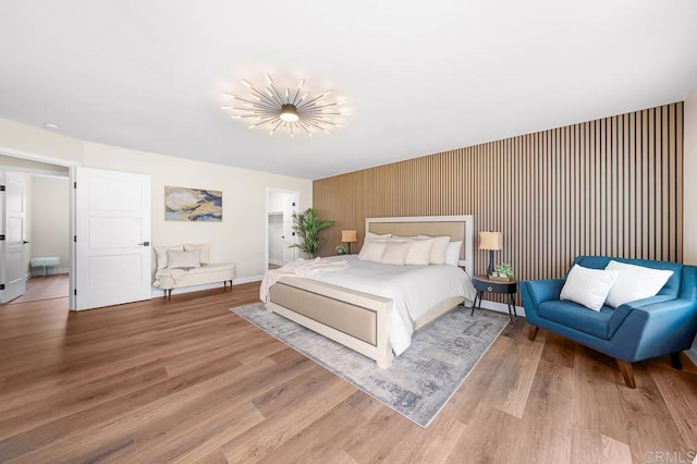6270 Meadowcrest Dr, La Mesa, CA 91942 - bedroom featuring an accent wall and wood finished floors