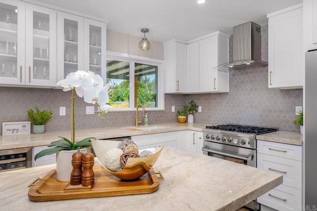 6270 Meadowcrest Dr, La Mesa, CA 91942 - kitchen with wall chimney exhaust hood, stainless steel appliances, white cabinets, backsplash, and glass insert cabinets
