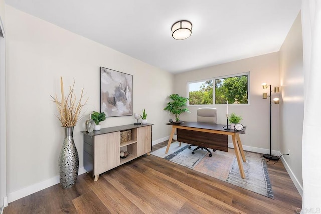 6270 Meadowcrest Dr, La Mesa, CA 91942 - home office with dark wood-type flooring and baseboards