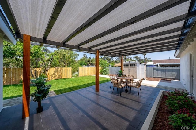 6270 Meadowcrest Dr, La Mesa, CA 91942 - fenced backyard with a storage unit, outdoor dining area, and a patio