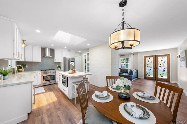 6270 Meadowcrest Dr, La Mesa, CA 91942 - dining space featuring light wood-type flooring and recessed lighting