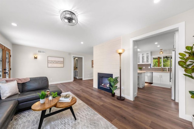 6270 Meadowcrest Dr, La Mesa, CA 91942 - living room with dark wood-style flooring, recessed lighting, and a fireplace
