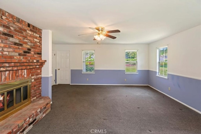31655 Pio Pico Rd, Temecula, CA 92592 - unfurnished living room featuring carpet floors, healthy amount of natural light, a ceiling fan, and a fireplace