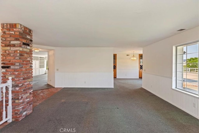 31655 Pio Pico Rd, Temecula, CA 92592 - carpeted spare room featuring a chandelier, a wainscoted wall, and french doors