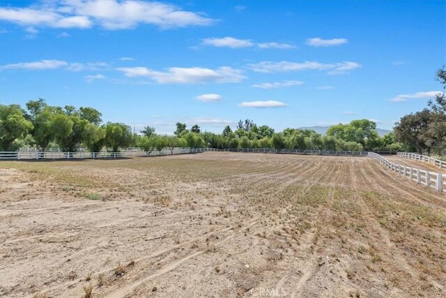 31655 Pio Pico Rd, Temecula, CA 92592 - view of yard featuring an enclosed horse arena and a rural view