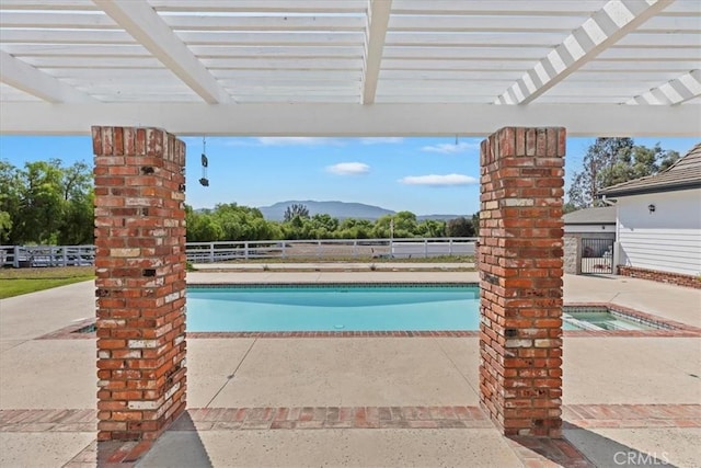 31655 Pio Pico Rd, Temecula, CA 92592 - view of pool featuring an in-ground hot tub, a patio, a pergola, and a mountain view