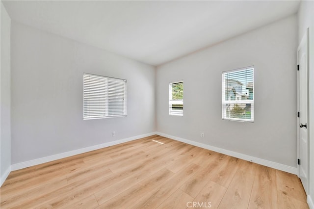 8 Caltrop Way, Ladera Ranch, CA 92694 - empty room featuring wood finished floors and baseboards