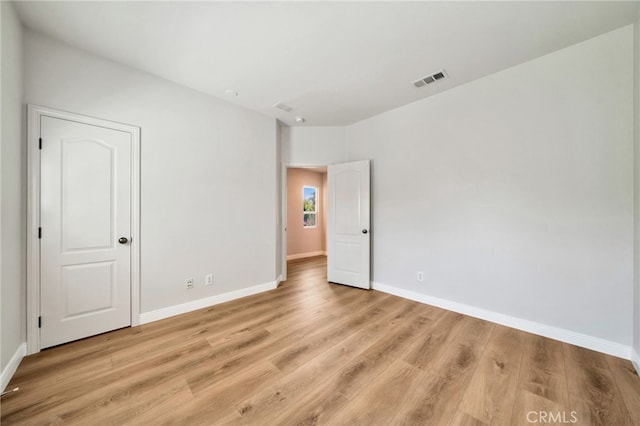 8 Caltrop Way, Ladera Ranch, CA 92694 - unfurnished bedroom featuring light wood finished floors and baseboards