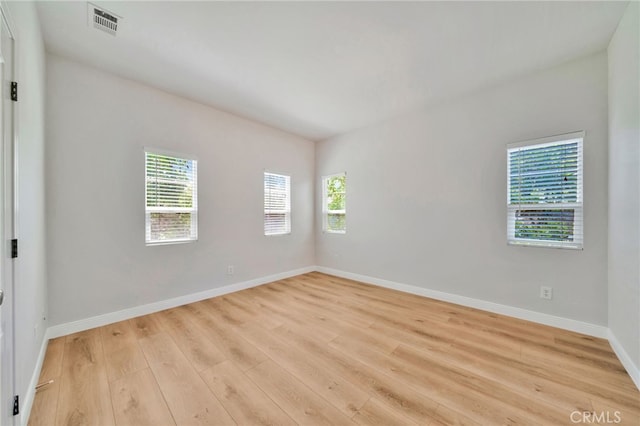 8 Caltrop Way, Ladera Ranch, CA 92694 - empty room with light wood-style floors and baseboards