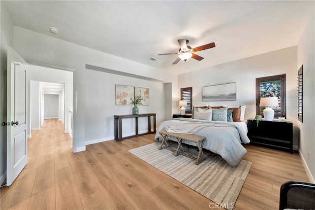 8 Caltrop Way, Ladera Ranch, CA 92694 - bedroom with light wood finished floors and a ceiling fan