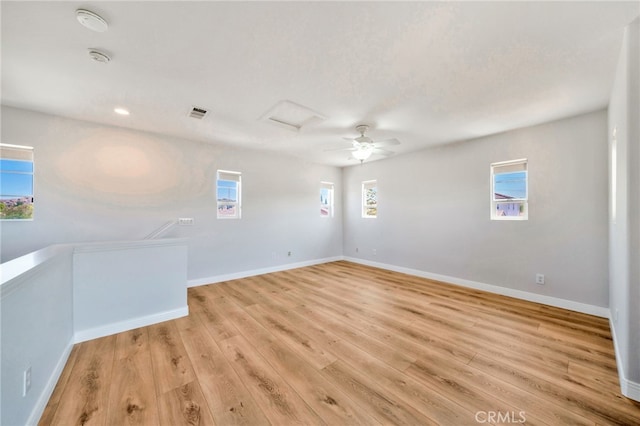 8 Caltrop Way, Ladera Ranch, CA 92694 - unfurnished room with light wood-type flooring, a smoke detector, and attic access