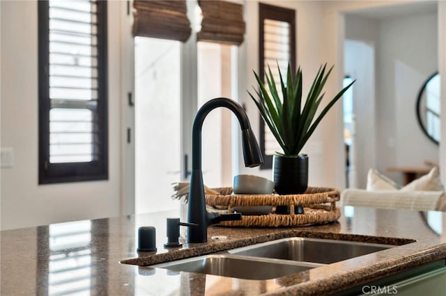 8 Caltrop Way, Ladera Ranch, CA 92694 - kitchen view of a sink and dark stone countertops