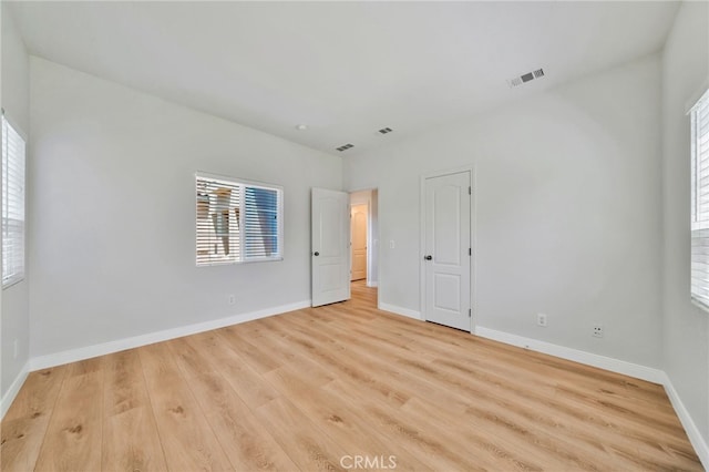 8 Caltrop Way, Ladera Ranch, CA 92694 - unfurnished bedroom with light wood-type flooring and baseboards