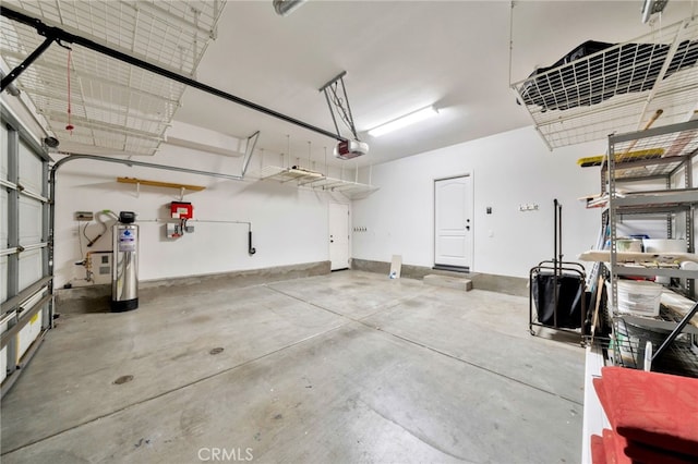 8 Caltrop Way, Ladera Ranch, CA 92694 - garage featuring a garage door opener and water heater