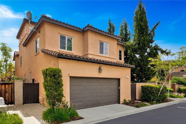 8 Caltrop Way, Ladera Ranch, CA 92694 - view of front of home with a garage, stucco siding, driveway, and a tile roof