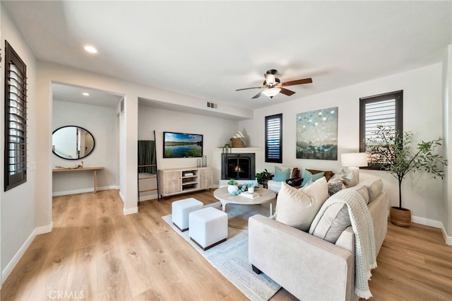 8 Caltrop Way, Ladera Ranch, CA 92694 - living room with ceiling fan, light wood-type flooring, healthy amount of natural light, and recessed lighting