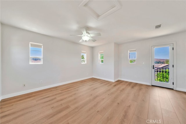 8 Caltrop Way, Ladera Ranch, CA 92694 - empty room featuring attic access, light wood-style flooring, and ceiling fan