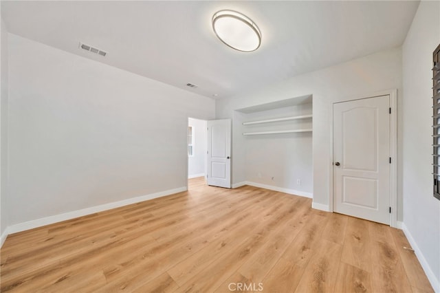 8 Caltrop Way, Ladera Ranch, CA 92694 - unfurnished bedroom with light wood-style floors and a closet