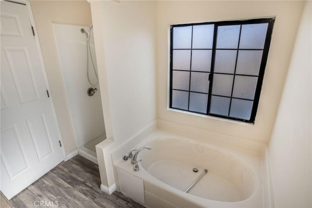49750 Three Points Rd, Lancaster, CA 93536 - full bathroom with a bath, wood finished floors, healthy amount of natural light, and a shower