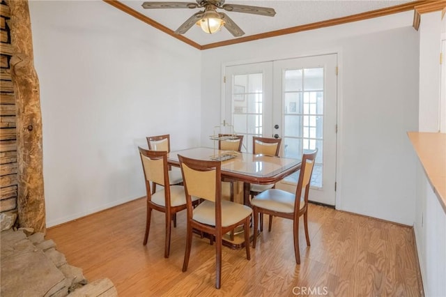 49750 Three Points Rd, Lancaster, CA 93536 - dining space featuring french doors, ornamental molding, light wood-type flooring, and ceiling fan