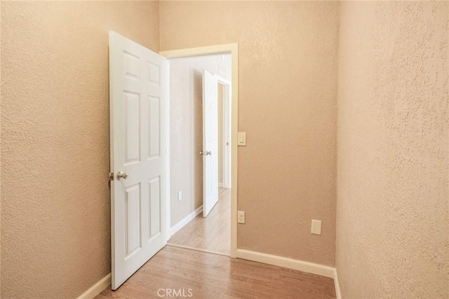 49750 Three Points Rd, Lancaster, CA 93536 - spare room featuring wood finished floors and a textured wall