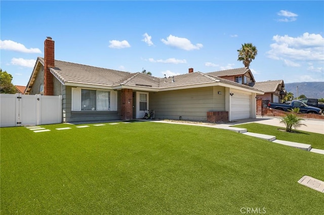 7550 Periwinkle Dr, Fontana, CA 92336 - ranch-style home featuring a gate, a garage, concrete driveway, a chimney, and a tile roof