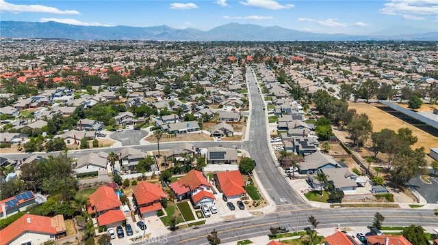 7550 Periwinkle Dr, Fontana, CA 92336 - aerial view of residential area featuring mountains