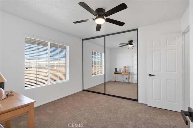 9191 White Rd, Phelan, CA 92371 - bedroom with carpet flooring, a closet, and ceiling fan