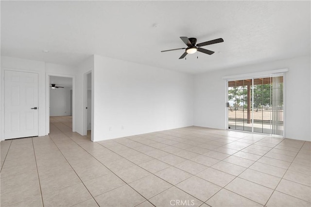 9191 White Rd, Phelan, CA 92371 - empty room featuring a ceiling fan and light tile patterned floors