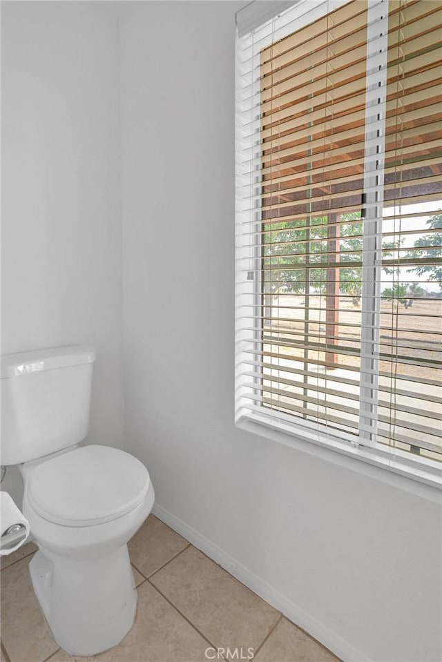 9191 White Rd, Phelan, CA 92371 - bathroom featuring tile patterned floors and toilet