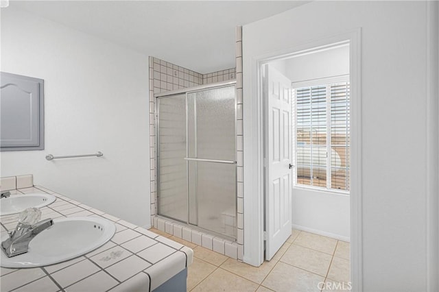 9191 White Rd, Phelan, CA 92371 - full bath with a stall shower, double vanity, and tile patterned flooring