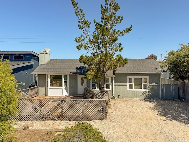 569 Huntington Rd, Cambria, CA 93428 - view of front of property with a chimney and a shingled roof