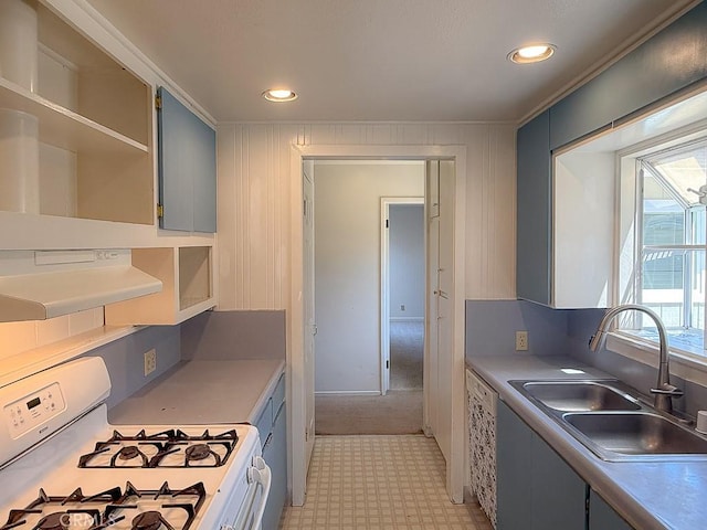 569 Huntington Rd, Cambria, CA 93428 - kitchen with white range with gas stovetop, range hood, crown molding, open shelves, and light countertops