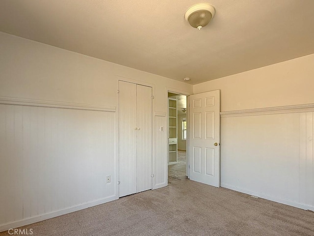 569 Huntington Rd, Cambria, CA 93428 - unfurnished bedroom featuring carpet flooring and a closet