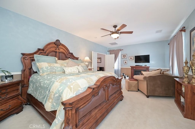11180 Bridgefield Ct, Riverside, CA 92505 - carpeted bedroom with ceiling fan and multiple windows
