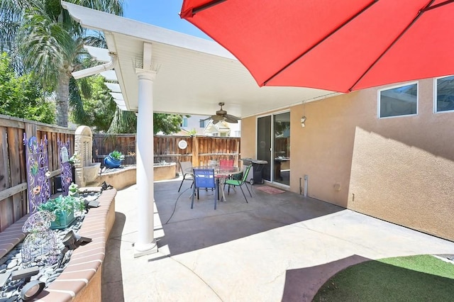 11180 Bridgefield Ct, Riverside, CA 92505 - fenced backyard with outdoor dining space, a patio, and a ceiling fan