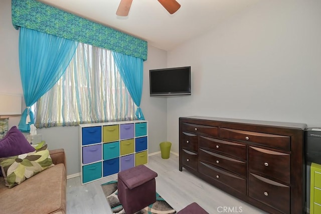 11180 Bridgefield Ct, Riverside, CA 92505 - bedroom featuring lofted ceiling, light wood-style flooring, and ceiling fan