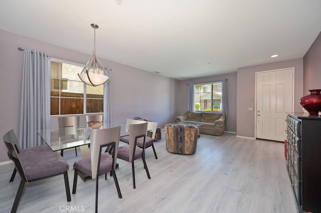 11180 Bridgefield Ct, Riverside, CA 92505 - dining area featuring light wood-type flooring and recessed lighting