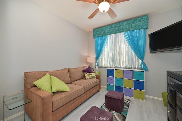 11180 Bridgefield Ct, Riverside, CA 92505 - living room with wood finished floors and ceiling fan
