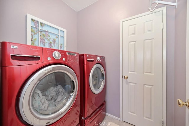 11180 Bridgefield Ct, Riverside, CA 92505 - washroom with separate washer and dryer and baseboards