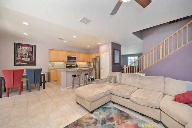 11180 Bridgefield Ct, Riverside, CA 92505 - living area with stairs, recessed lighting, a ceiling fan, and light tile patterned floors