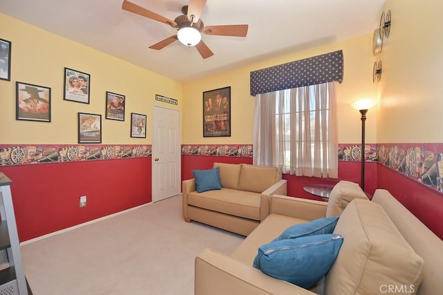 11180 Bridgefield Ct, Riverside, CA 92505 - living room featuring ceiling fan, carpet flooring, and a wainscoted wall