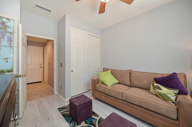 11180 Bridgefield Ct, Riverside, CA 92505 - living area with ceiling fan and light wood finished floors