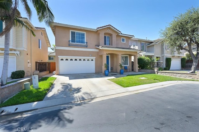 11180 Bridgefield Ct, Riverside, CA 92505 - mediterranean / spanish-style home featuring stucco siding, an attached garage, concrete driveway, and a tiled roof