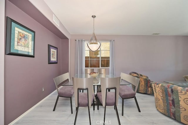 11180 Bridgefield Ct, Riverside, CA 92505 - dining area with light wood-style floors