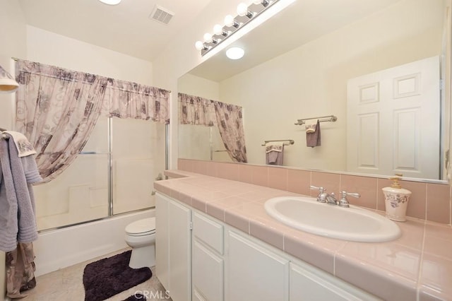 11180 Bridgefield Ct, Riverside, CA 92505 - bathroom featuring vanity and combined bath / shower with glass door