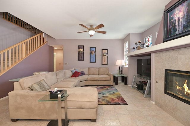11180 Bridgefield Ct, Riverside, CA 92505 - living area with ceiling fan, stairway, and a fireplace