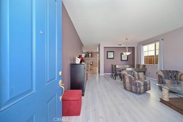 11180 Bridgefield Ct, Riverside, CA 92505 - living room with wood finished floors and baseboards